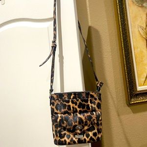 Carlos Santana crossbody